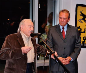 Mr. Grom addressing the public at the opening of his exhibit at the Embassy. On his left stands Ambassador Kirn.